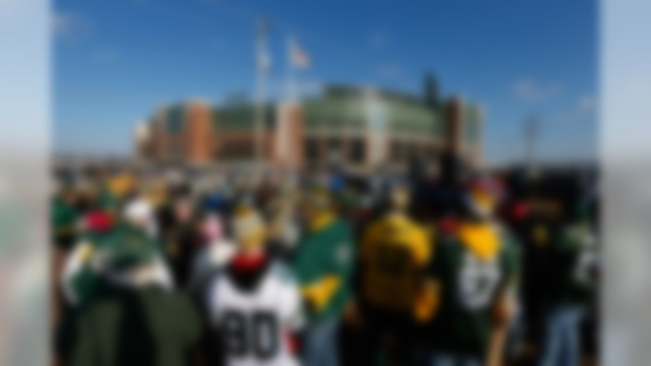 A general view of the exterior of Lambeau Field as Packers fans tailgate in the parking lots prior to a Week 17 NFL football game between the Detroit Lions against the Green Bay Packers in Green Bay, Wisconsin on Sunday, December 28, 2014. The Packers defeated the Lions 30-20. (AP Photo/Scott Boehm)