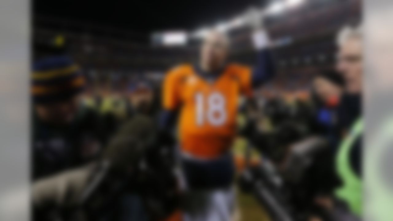 Denver Broncos quarterback Peyton Manning (18) celebrates after an NFL divisional playoff football game against the Pittsburgh Steelers on Sunday, Jan. 17, 2016 in Denver. The Broncos won, 23-16. (Ric Tapia/NFL)