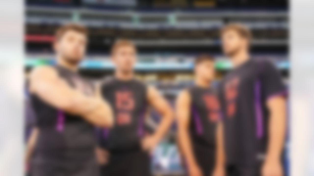 (L-R) Oklahoma quarterback Baker Mayfield,
UCLA quarterback Josh Rosen, Oklahoma State quarterback Mason Rudolph and Nebraska quarterback Tanner Lee stand around waiting to start a drill during the 2018 NFL Scouting Combine on Saturday, March 3, 2018 in Indianapolis.