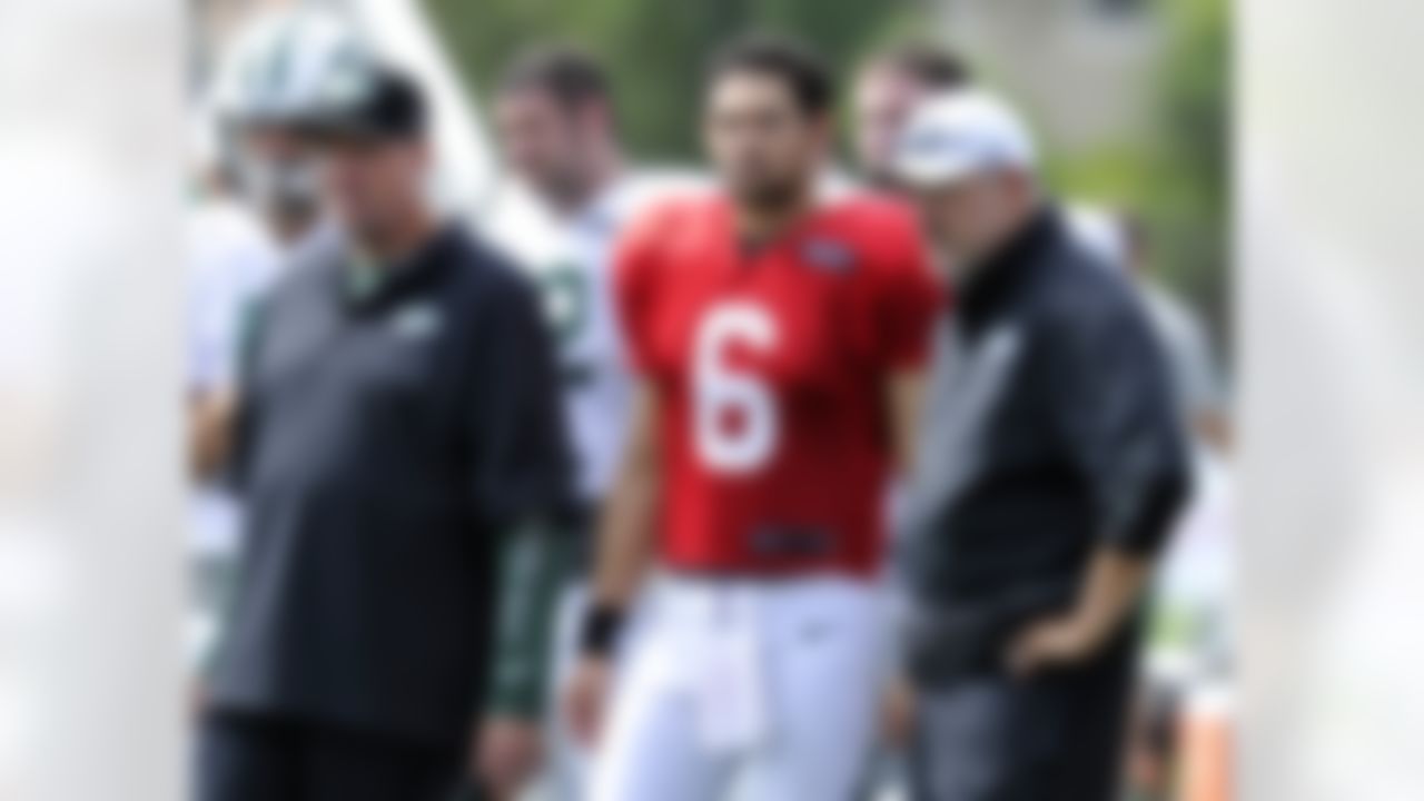 New York Jets coach Rex Ryan, left, quarterback Mark Sanchez (6) and quarterbacks coach Matt Cavanaugh watch practice at NFL football training camp on Sunday, July 29, 2012, in Cortland, N.Y. (AP Photo/Bill Kostroun)