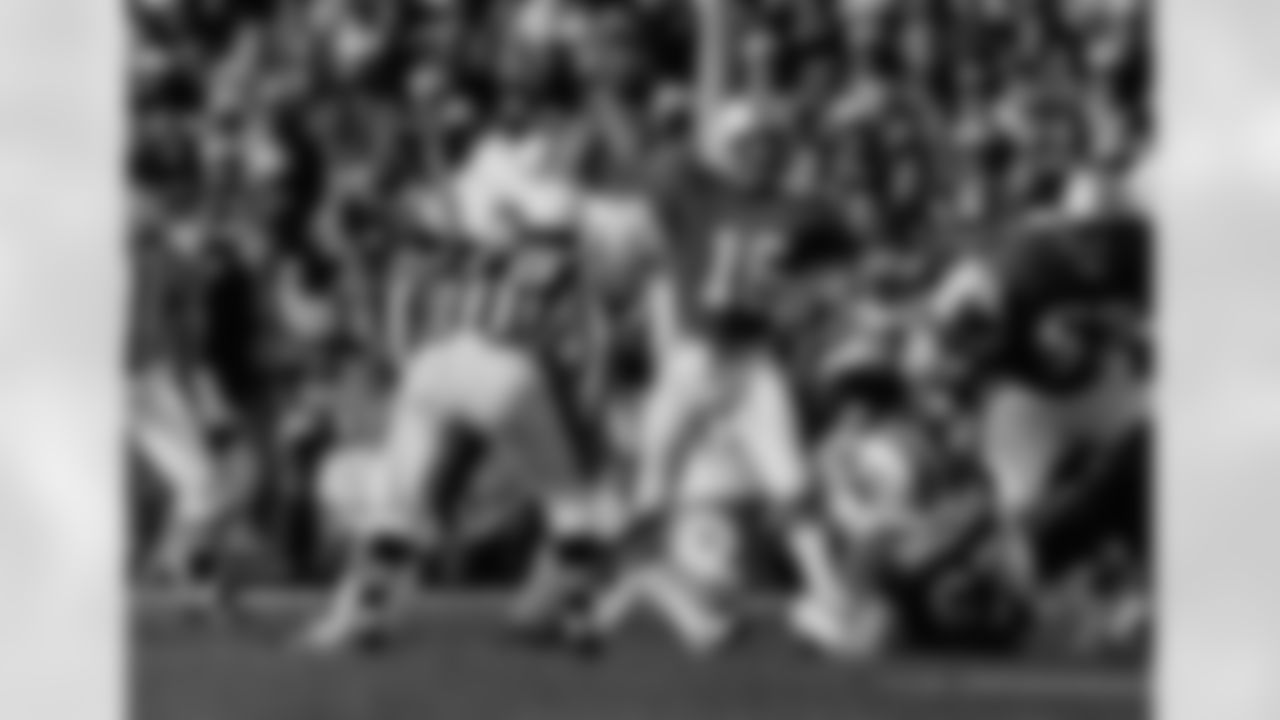 Miami Dolphins quarterback David Woodley (16) follows through on a first half pass during Super Bowl XVII game against the Washington Redskins at the Rose Bowl in Pasadena, CA on January 30, 1983. (Associated Press)