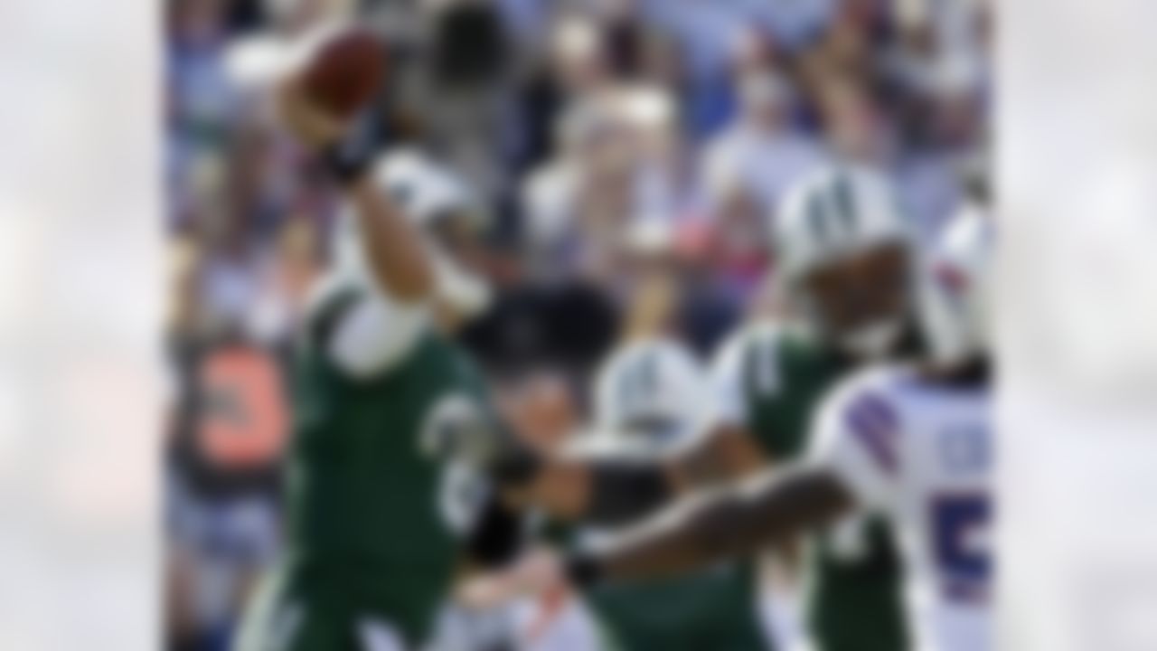New York Jets quarterback Mark Sanchez throws against the Buffalo Bills during the first quarter of an NFL football game in Orchard Park, N.Y., Sunday, Nov. 6, 2011. (AP Photo/David Duprey)