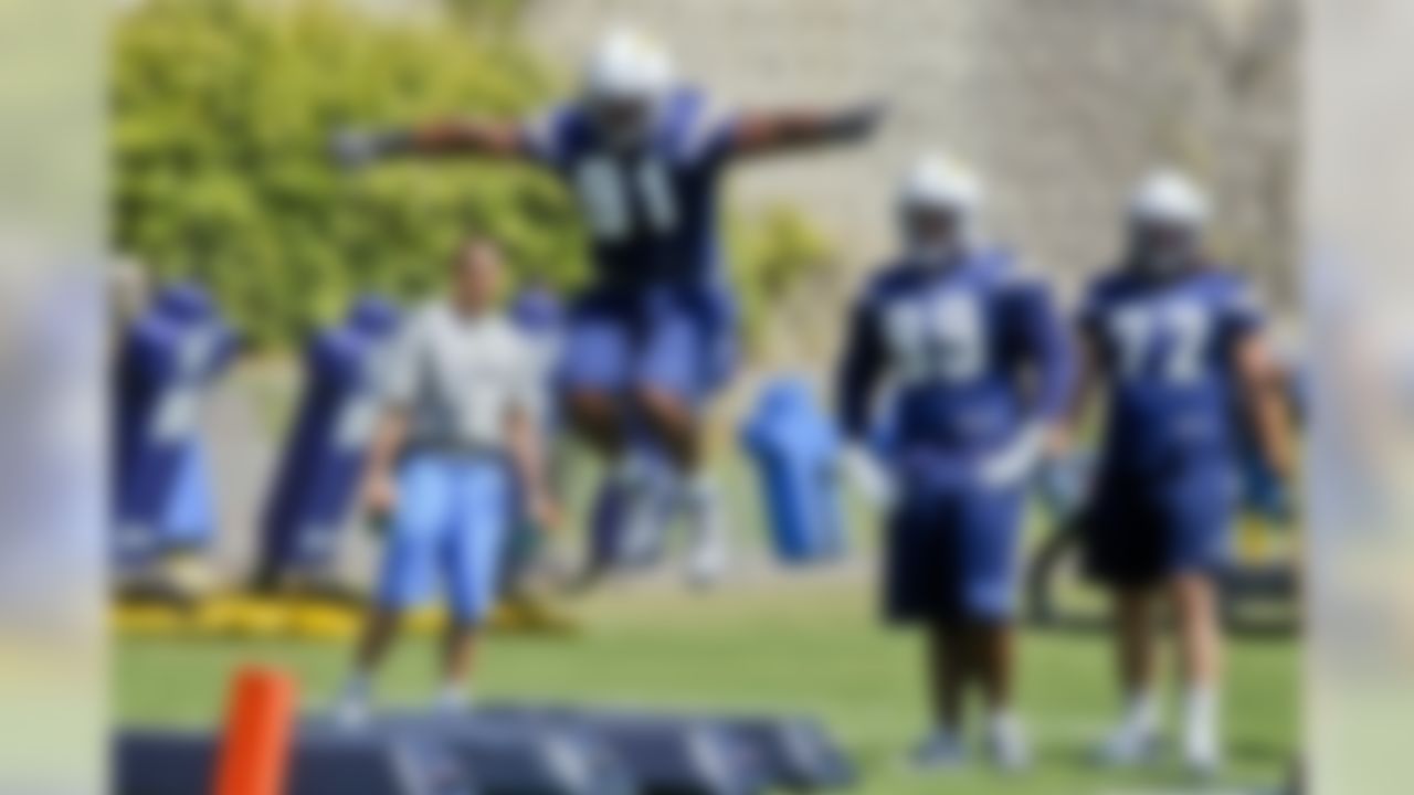 San Diego Chargers defensive end Kendall Reyes jumps while performing drills during NFL football practice at the team's training camp, Monday, July 23, 2012, in San Diego. (AP Photo/Lenny Ignelzi)