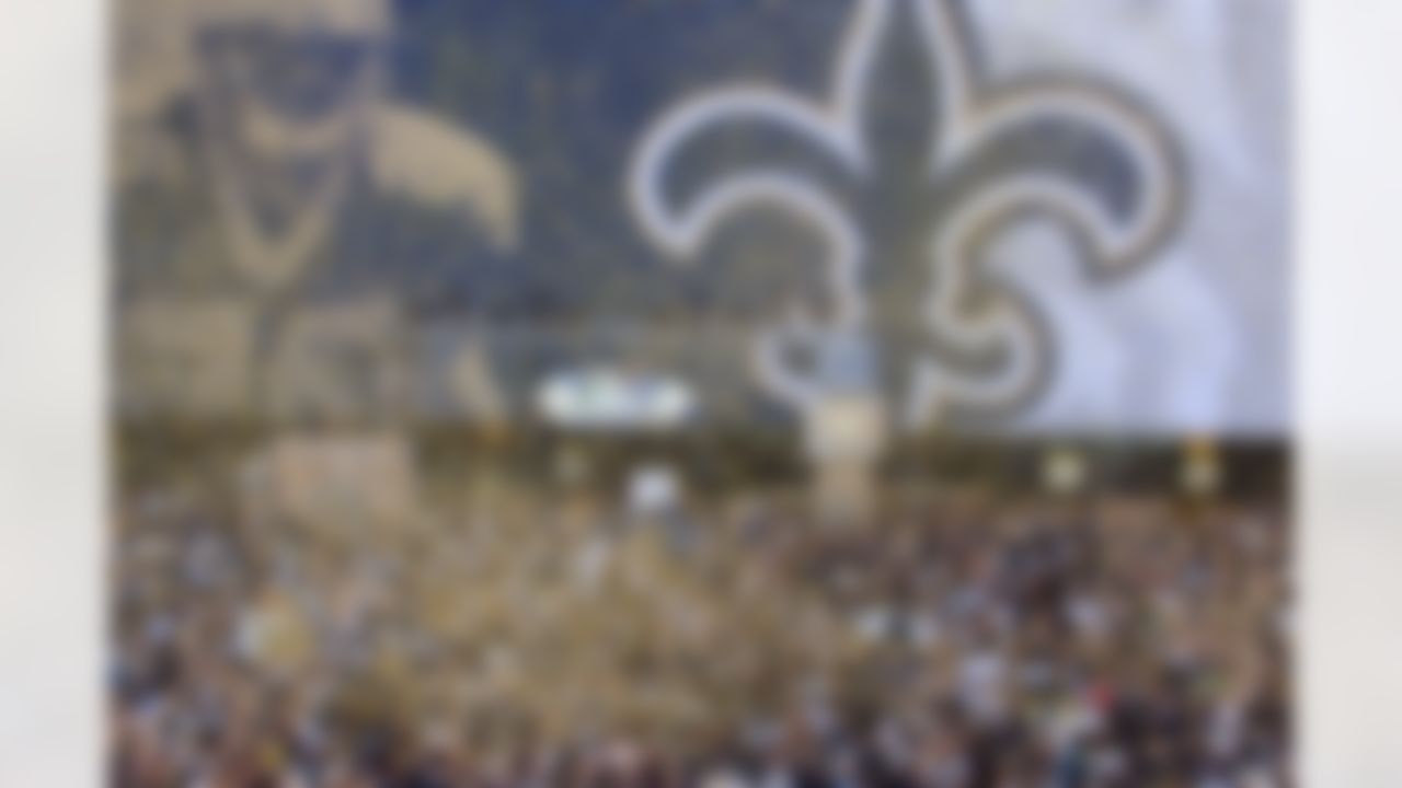 Confetti flys as the banner drops outside the Louisana Superdome before the ESPN Monday Night Football game September 25, 2006 in New Orleans. Photo by Getty Images.