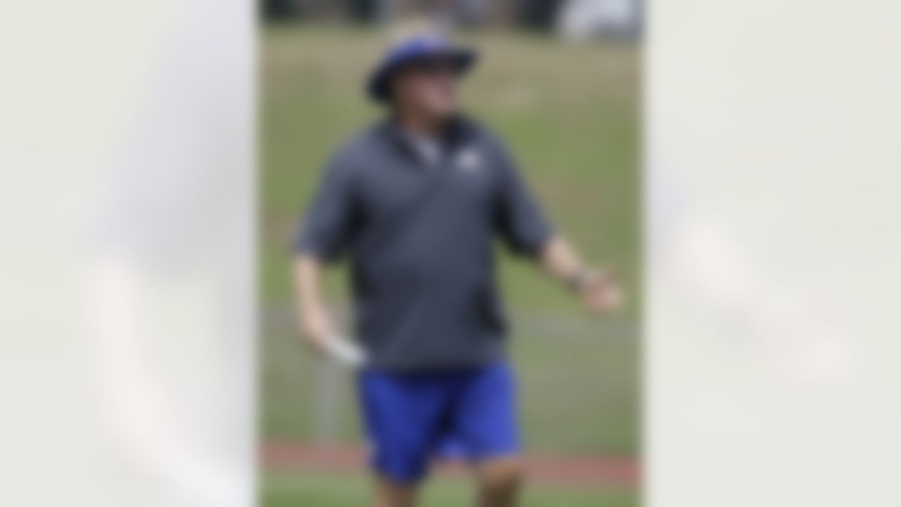 New York Giants offensive coordinator Kevin Gilbride gestures at the New York Giants football training camp in Albany, N.Y., Friday, July 27, 2012. (AP Photo/Kathy Willens)