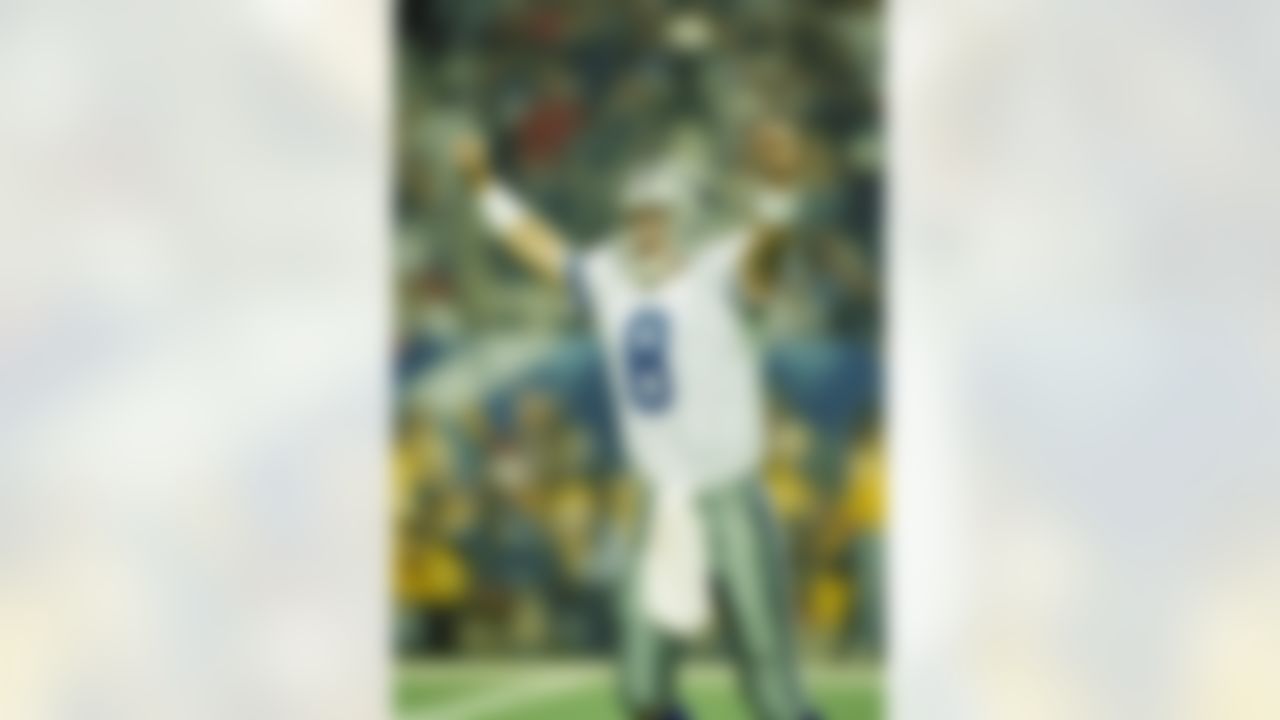 Dallas Cowboys' quarterback Troy Aikman celebrates a 15-yard third-quarter touchdown by running back Emmitt Smith (not pictured) in Super Bowl XXVIII at the Georgia Dome in Atlanta, against the Buffalo Bills, Jan. 30, 1994. The Cowboys beat the Bills 30-13 for their second straight Super Bowl championship. (AP Photo/Doug Mills)