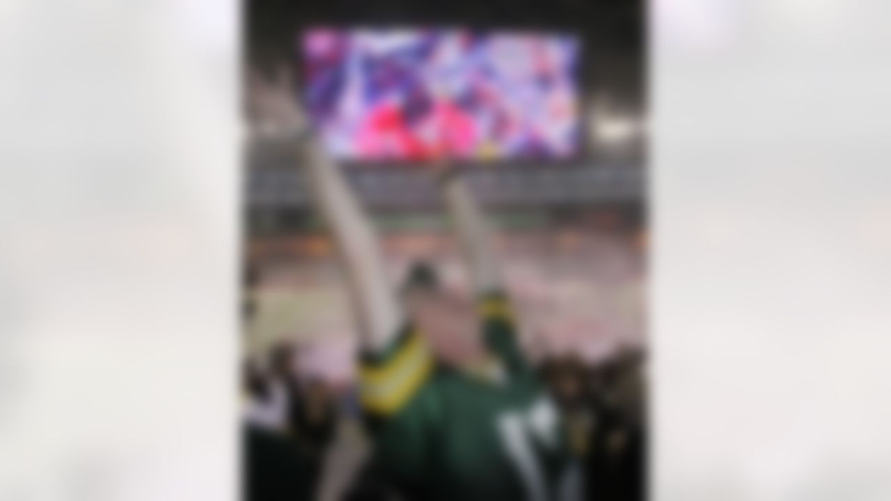 Green Bay Packers fan John Magnin celebrates after the NFL football Super Bowl XLV Sunday, Feb. 6, 2011, in Arlington, Texas. The Packers beat the Pittsburgh Steelers 31-25.(AP Photo/LM Otero)