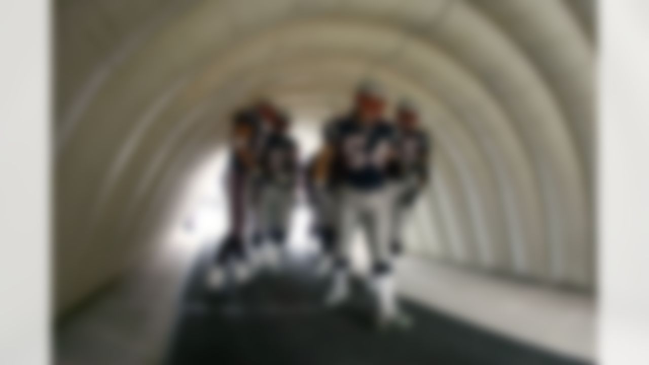 FOXBORO, MA - JANUARY 2: Tedy Bruschi #54 of the New England Patriots leads his defense out of the tunnel to the field for their game against the San Francisco 49ers during their game on January 2, 2005 at Gillette Stadium in Foxboro, Massachusetts. (Photo by Al Bello/Getty Images)