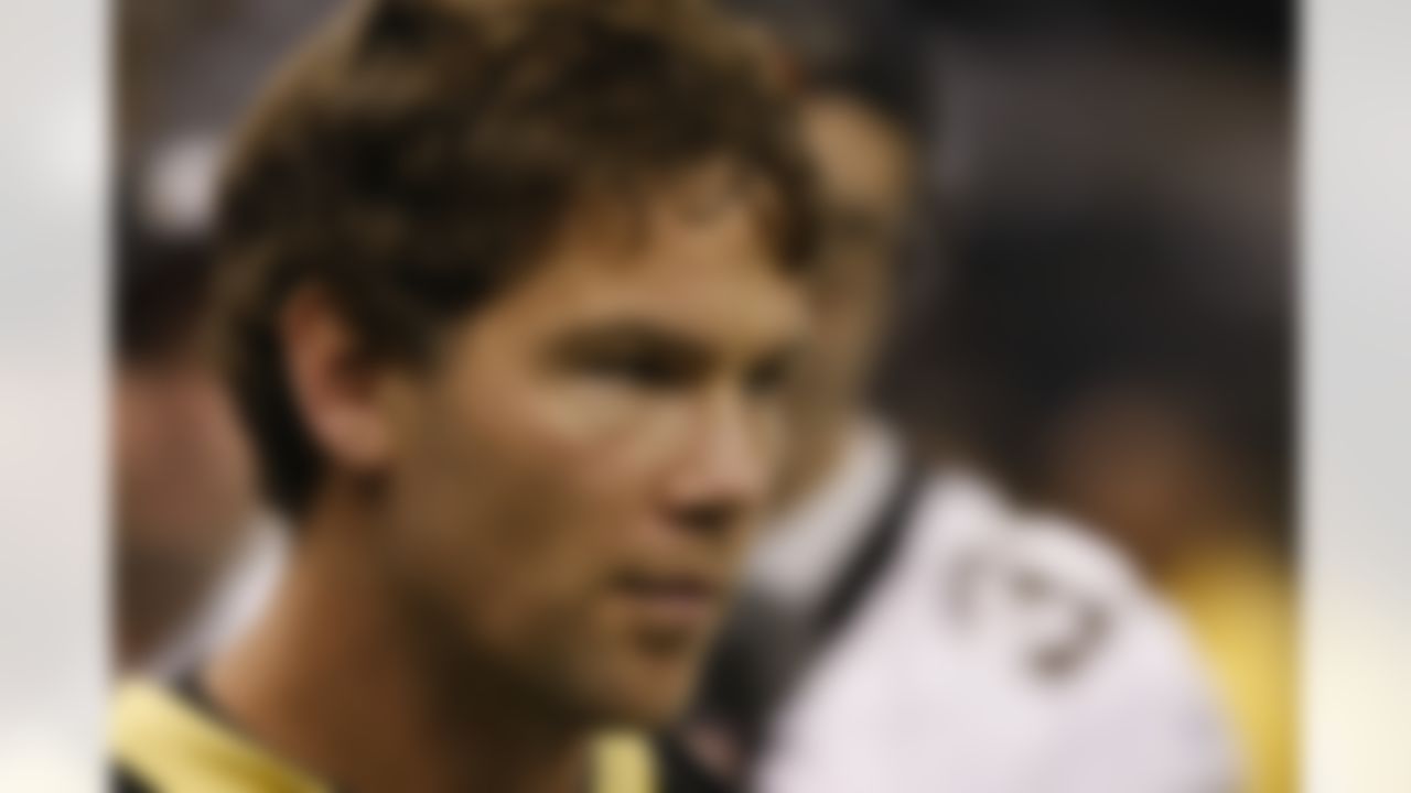 Former New Orleans Saints football player Steve Gleason walks off the field before the first half of an NFL football game against the Houston Texans, Sunday, Sept. 25, 2011, in New Orleans. (AP Photo/Mike Stewart)