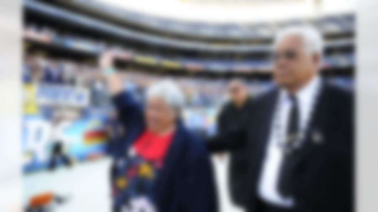 May 11, 2012; San Diego, CA, USA; Luisa Seau and Tiaina Seau, mother and father of Junior Seau, enter prior to a celebration of life service to remember Junior Seau at Qualcomm Stadium. Mandatory Credit: Christopher Hanewinckel-US PRESSWIRE