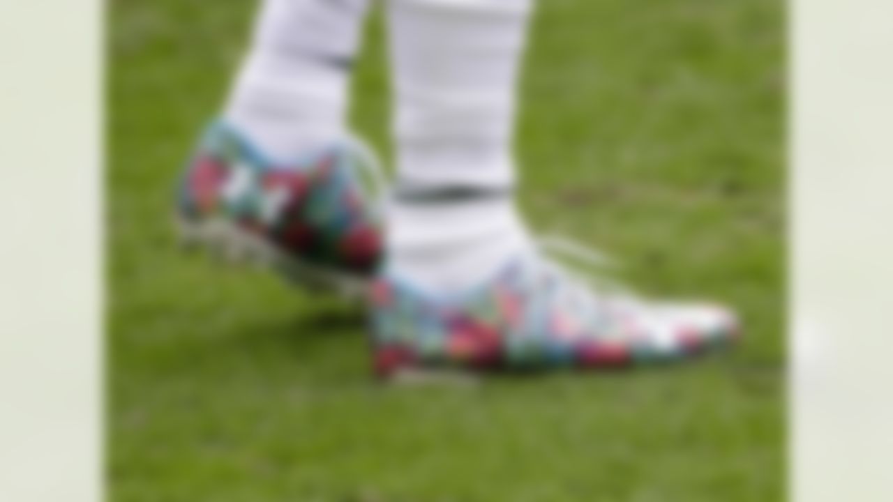Marshall suited up against the Dolphins with these multicolor Under Armour cleats that feature different color palm fronds.