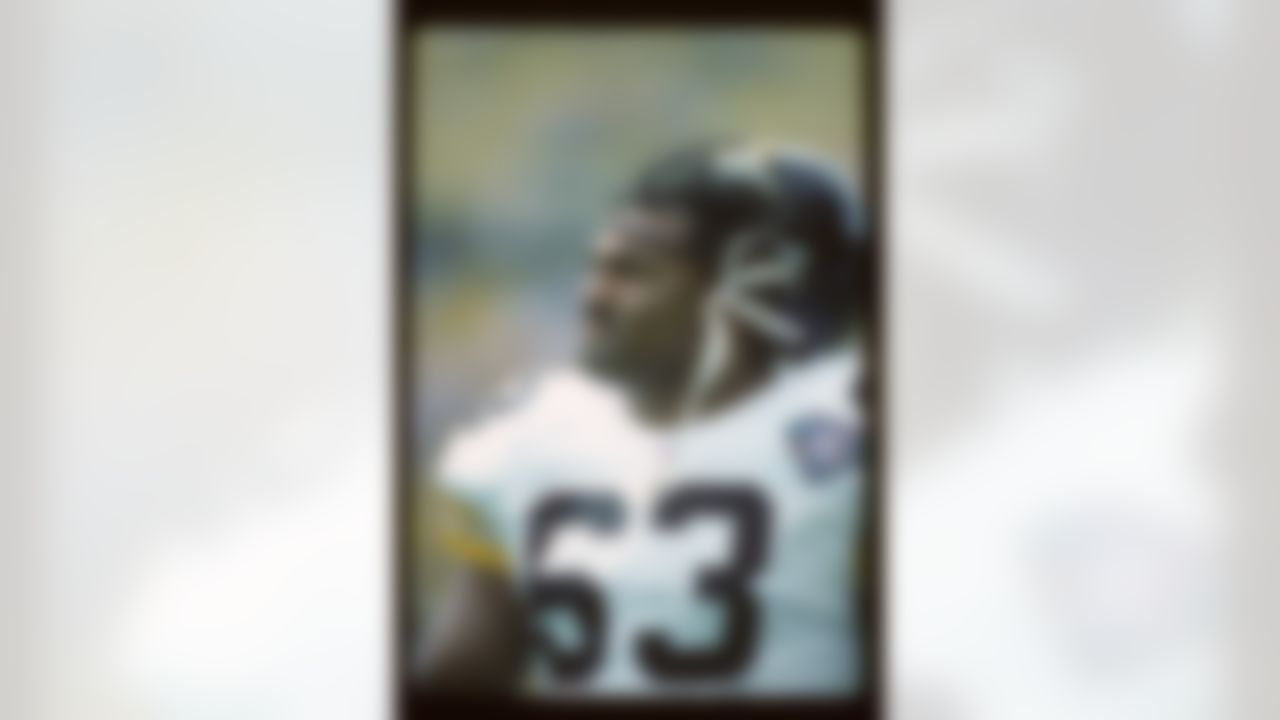 Pittsburgh Steelers offensive center Dermontti Dawson (63) looks up from the field with his helmet up during a NFL football game against the Seattle Seahawks on September 25, 1994 in Seattle. The Seahawks won the game 30-13. (AP Photo/Paul Jasienski)