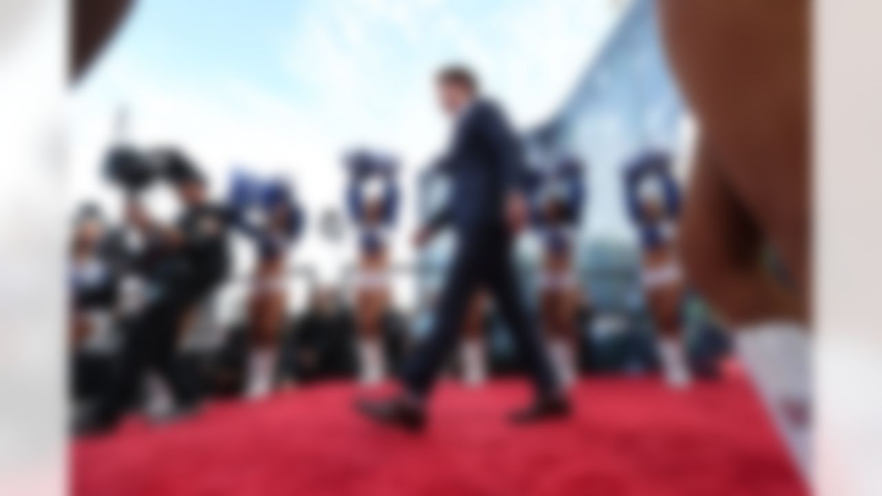 USC quarterback Sam Darnold walks down the red carpet.