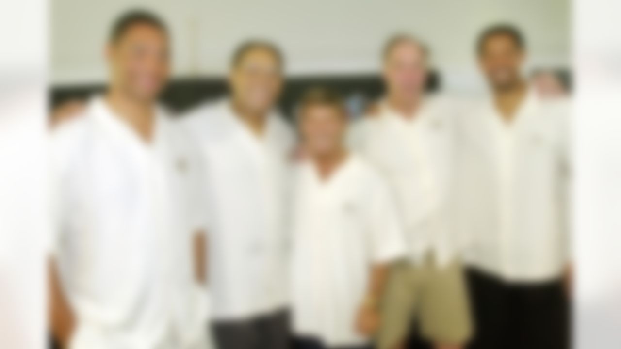 Inductees into the National Football League Hall of Fame for 2003 pose for a group photo in Honolulu Friday, Jan. 31, 2003. From left are Marcus Allen, Elvin Bethea, Hank Stram, Joe DeLamielleure and James Lofton. The five will be enshrined at the Hall in Canton, Ohio, next summer. (AP Photo/Reed Saxon)
