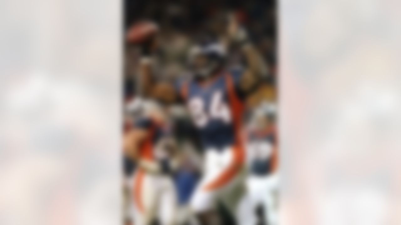 Shannon Sharpe #84 of the Denver Broncos celebrates after scoring a touchdown. Sharpe was selected in the 7th round of the 1990 NFL Draft, 192nd overall, by the Broncos. He remained with Denver until 1999 [4], winning two championship rings in Super Bowl XXXII and Super Bowl XXXIII, before going to the Ravens for 2 seasons and winning Super Bowl XXXV.  Sharpe was selected All-Pro 4 times, played in 8 Pro Bowls(1992-1998, 2001) and amassed over 1,000 receiving yards in 3 different seasons, with 10,060 career yards in 815 receptions. (Photo by Brian Bahr/Getty Images)