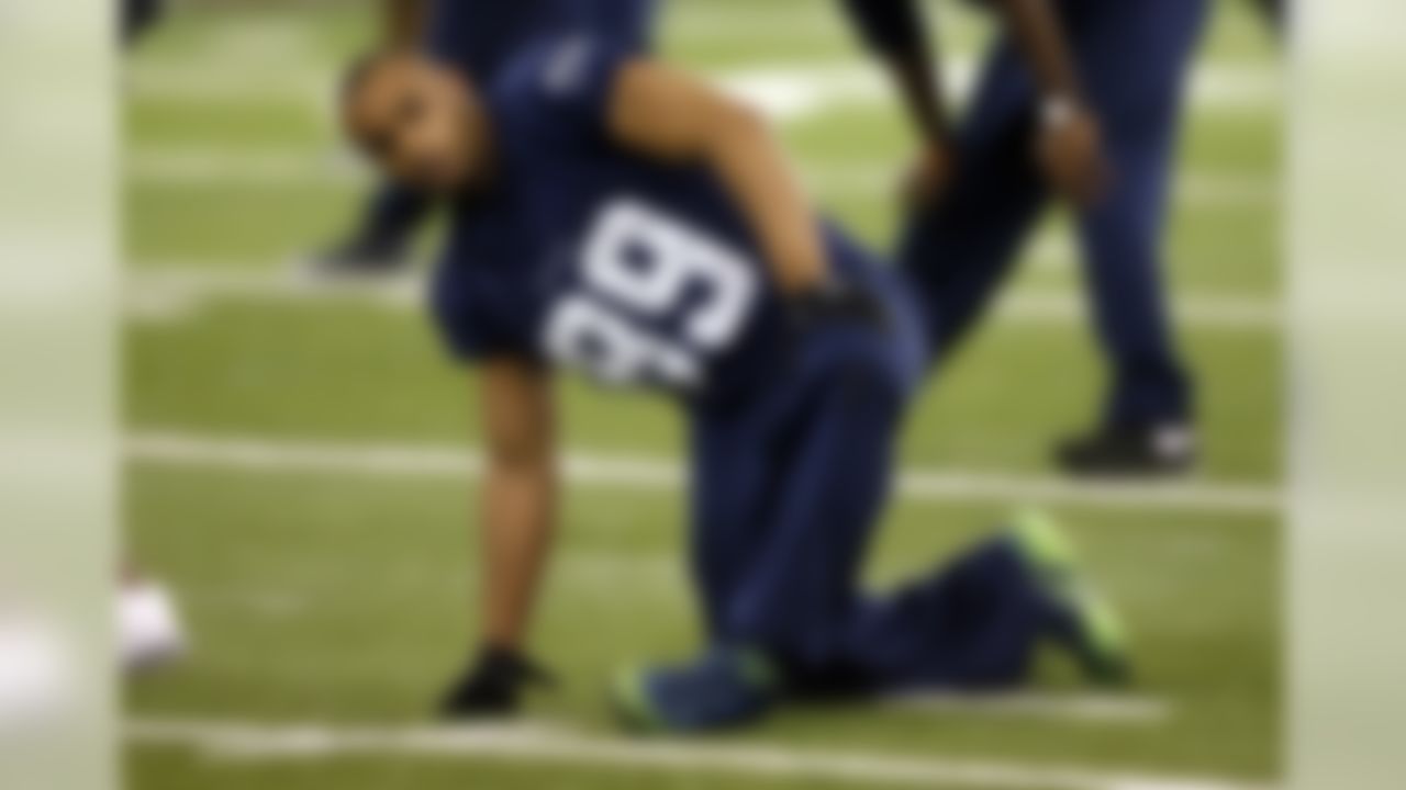 Seattle Seahawks' Doug Baldwin stretches during a team practice for NFL Super Bowl XLIX football game, Friday, Jan. 30, 2015, in Tempe, Ariz. The Seahawks play the New England Patriots in Super Bowl XLIX on Sunday, Feb. 1, 2015. (AP Photo/Matt York)
