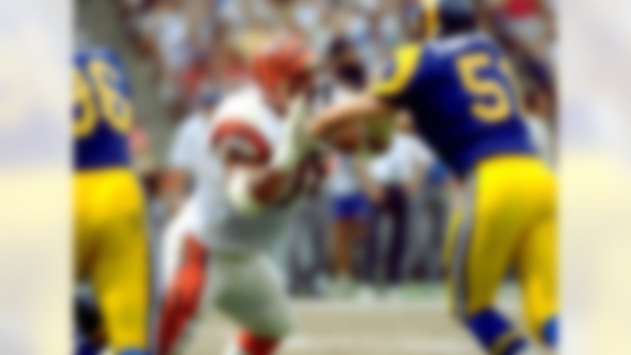 Cincinnati Bengals offensive tackle Anthony Munoz, engages with Los Angeles Rams linebacker Brett Faryniarz (51) during a 34-31 Bengals victory on October 7, 1990, at Anahiem Stadium in Anahiem, California. (National Football League)