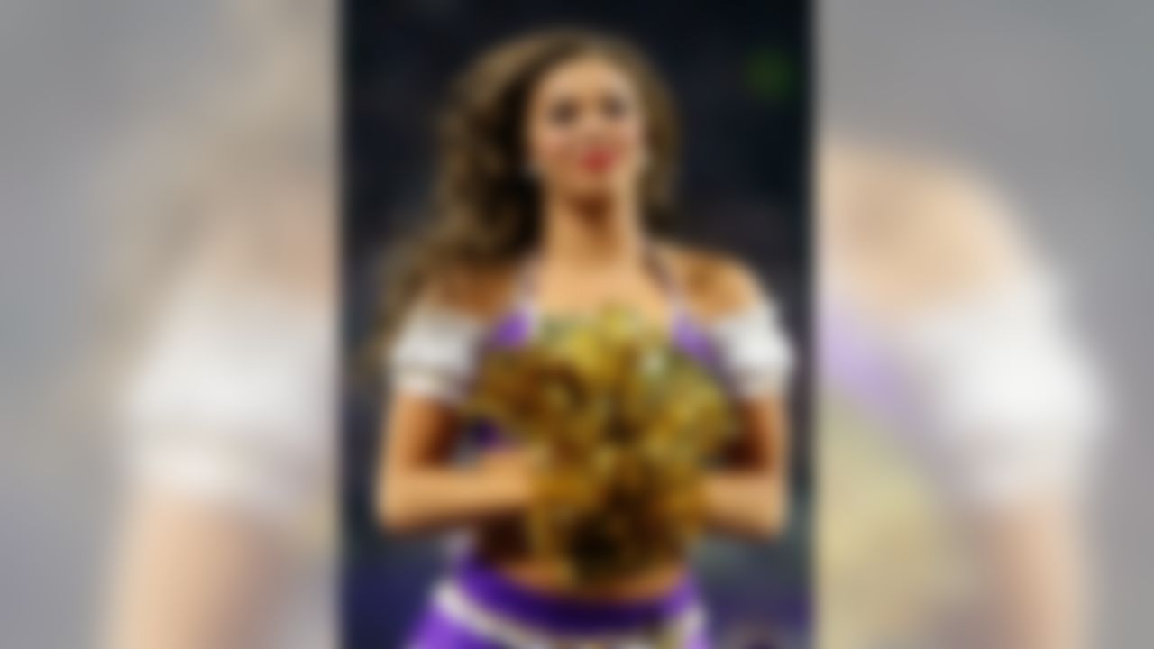 A Minnesota Vikings cheerleader performs during the first half of an NFL football game against the New Orleans Saints, Sunday, Oct. 28, 2018, in Minneapolis.