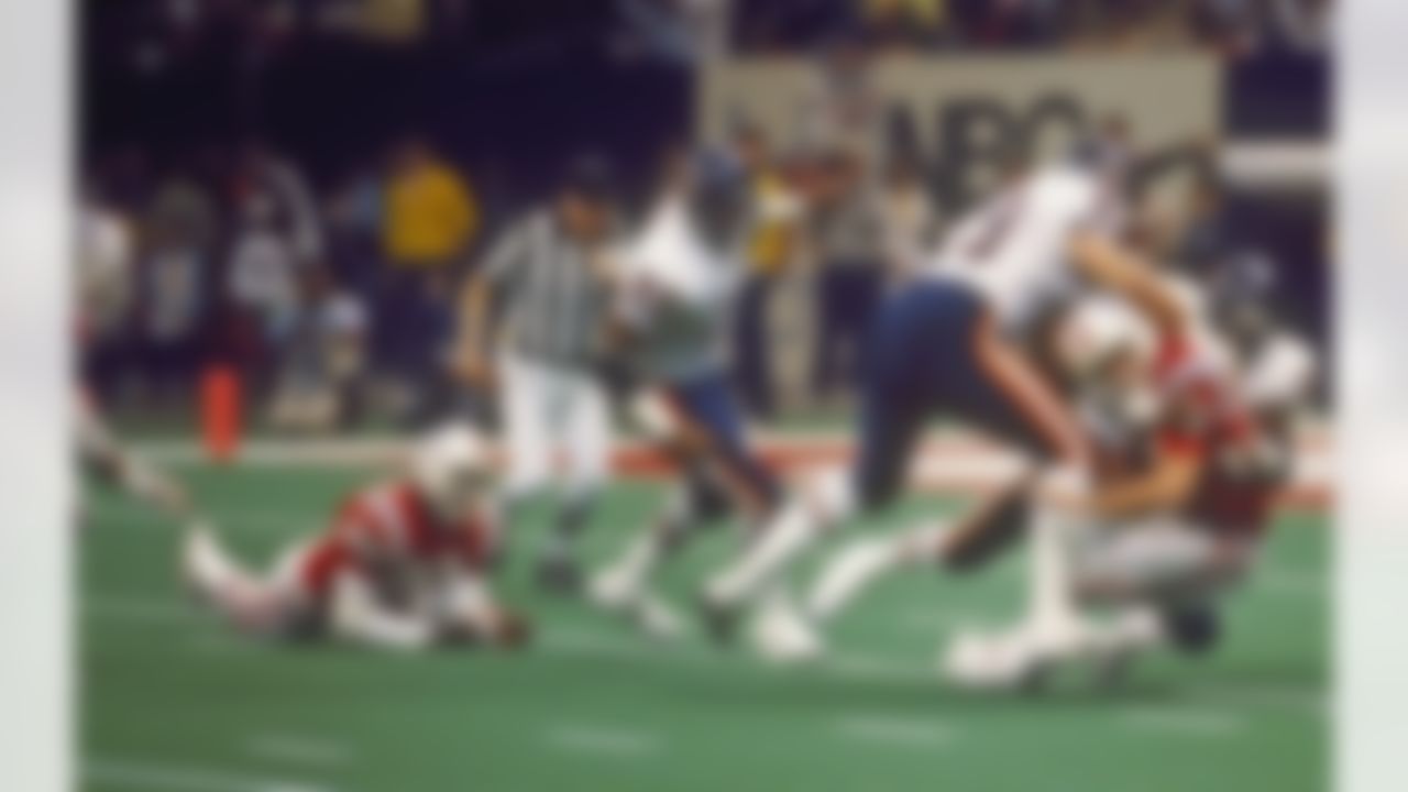 Chicago Bears linebacker Otis Wilson and defensive tackle Dan Hampton sack New England Patriots quarterback Steve Grogan during Super Bowl XX, a 46-10 Bears victory on January 26, 1986, at the Louisiana Superdome in New Orleans, LA. (AP Photo/Al Messerschmidt)