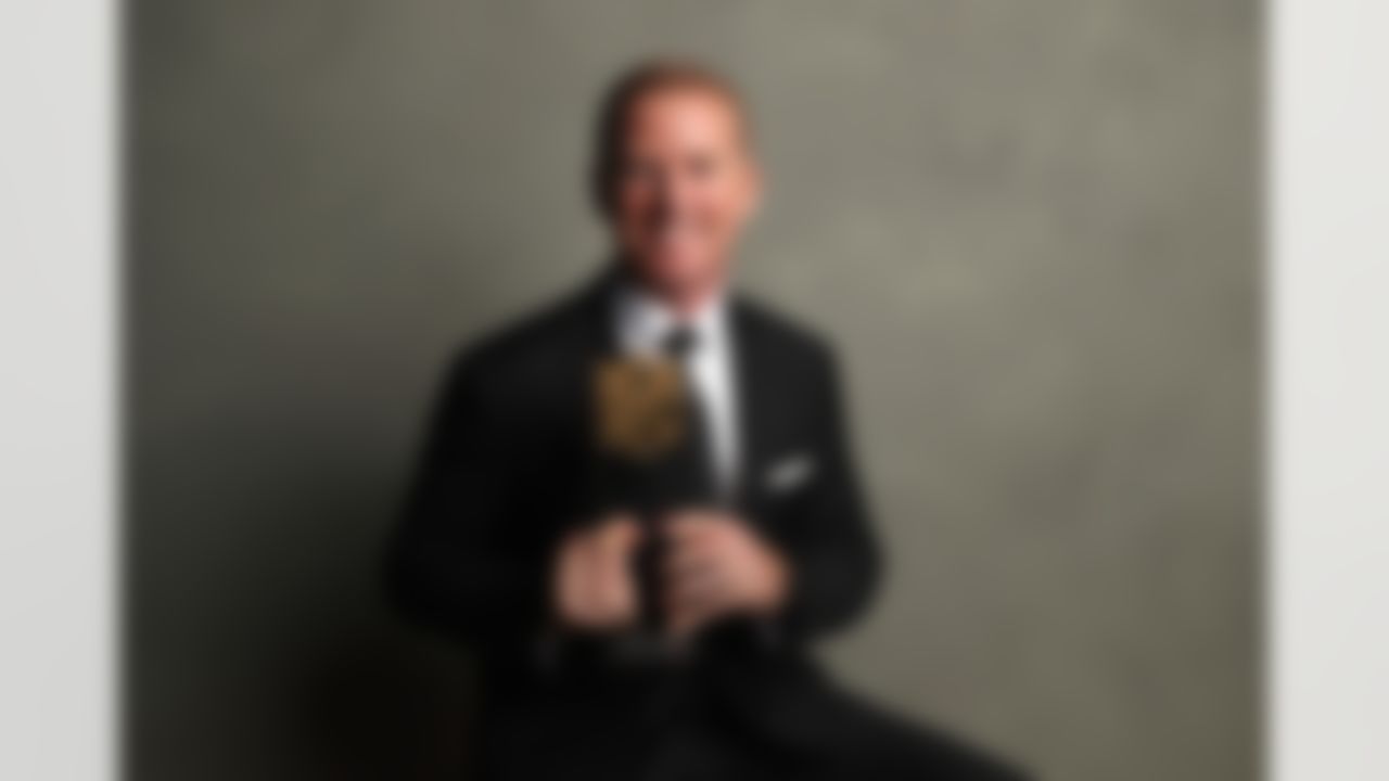 Dallas Cowboys head coach Jason Garrett poses for a photo with the AP Coach of the Year award during the 6th annual NFL Honors award show at the Wortham Theater Center on Saturday, Feb. 4, 2017 in Houston. (Ben Liebenberg/NFL)