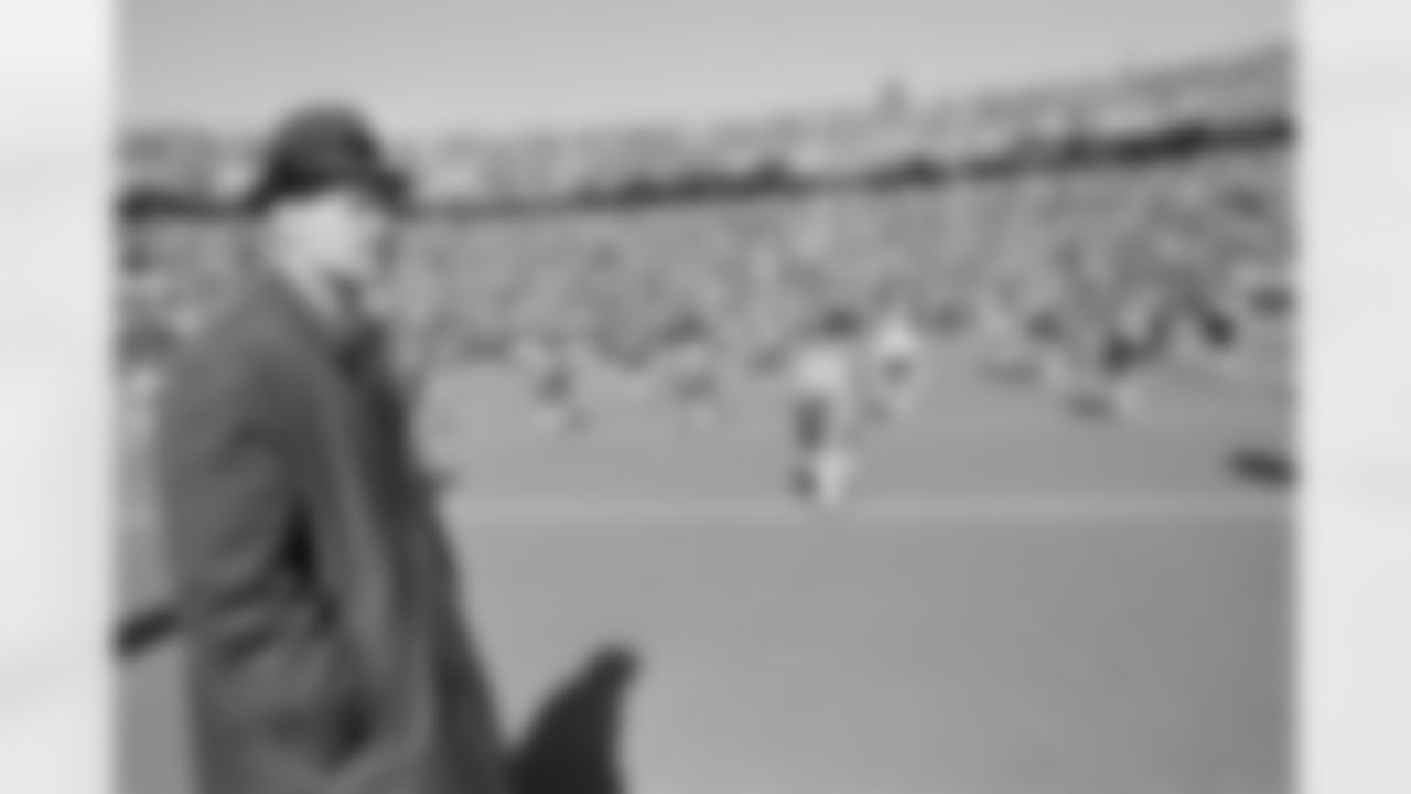 Dallas coach Tom Landry takes the field with the team as they loosen up prior to Super Bowl VI, Sunday, Jan. 16, 1972 in New Orleans. (Associated Press)
