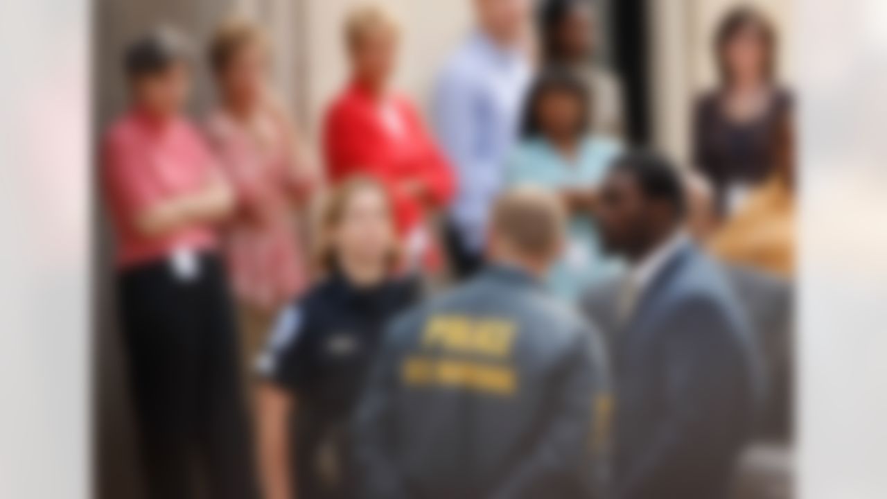 RICHMOND, VA - AUGUST 27: Atlanta Falcons quarterback Michael Vick (R) arrives at federal court August 27, 2007 in Richmond, Virginia. The football star was expected to plead guilty to a federal dogfighting conspiracy charge. The NFL has suspended Vick indefinitely. (Photo by Win McNamee/Getty Images)