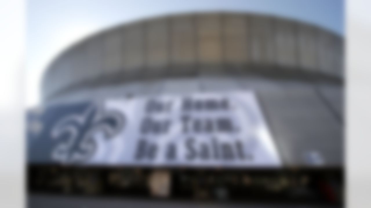 A sign hangs on the Louisiana Superdome the day after its re-opening in New Orleans on Tuesday, Sept. 26, 2006. (AP Photo/Alex Brandon)