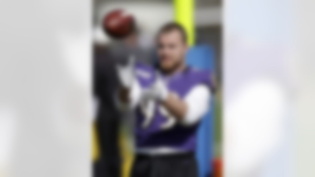 Baltimore Ravens linebacker Paul Kruger prepares to catch a pass during an NFL Super Bowl XLVII practice on Friday, Feb. 1, 2013, in Metairie, La. The Ravens face the San Francisco 49ers in Super Bowl XLVII on Sunday, Feb. 3. (AP Photo/Patrick Semansky)