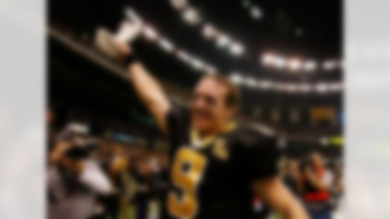 NEW ORLEANS - JANUARY 13: Drew Brees #9 of the New Orleans Saints celebrates after defeating the Philadelphia Eagles during the NFC divisional playoff game at the Superdome on January 13, 2007 in New Orleans, Louisiana.The Saints won the game 27-24. Photo by Getty Images.