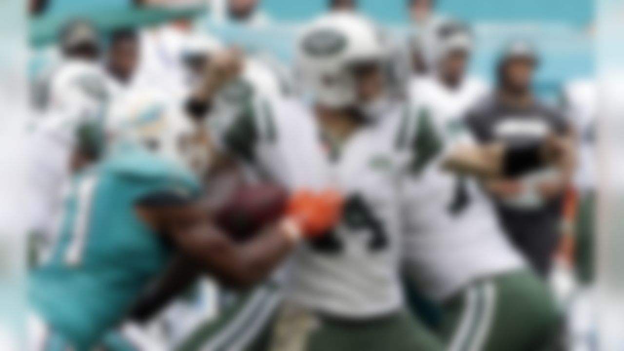 Miami Dolphins defensive end Cameron Wake (91) sacks New York Jets quarterback Ryan Fitzpatrick (14) during the first half of an NFL football game, Sunday, Nov. 6, 2016, in Miami Gardens, Fla. (AP Photo/Wilfredo Lee)