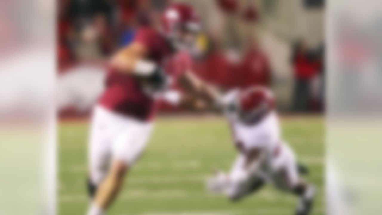 Oct 11, 2014; Fayetteville, AR, USA; Arkansas Razorbacks tight end AJ Derby (11) pushes off of Alabama Crimson Tide defensive back Geno Smith (24) scoring a touchdown on the play at Donald W. Reynolds Razorback Stadium. Alabama defeated Arkansas 14-13. Mandatory Credit: Nelson Chenault-USA TODAY Sports