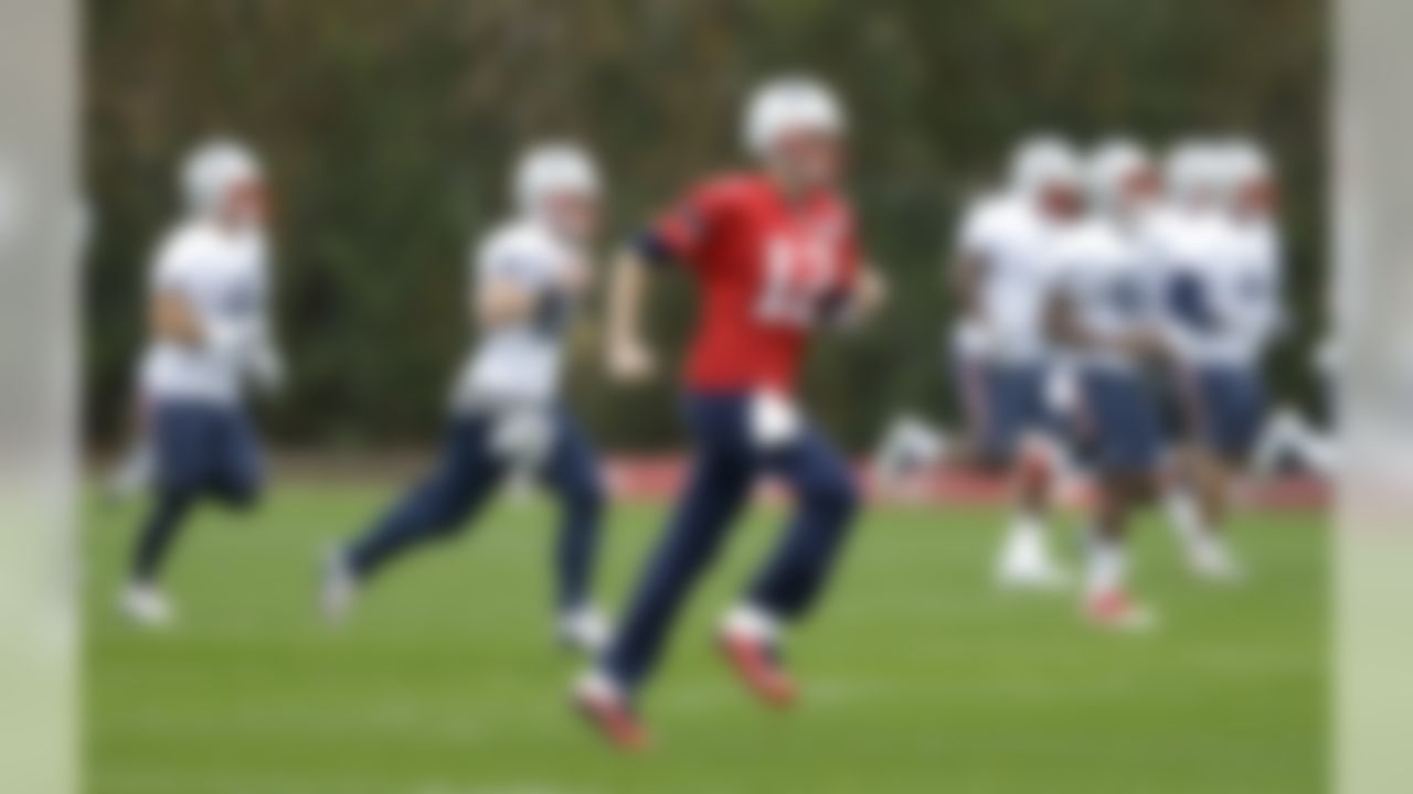 New England Patriots quarterback Tom Brady (12) warms up during practice Friday, Jan. 30, 2015, in Tempe, Ariz. The Patriots play the Seattle Seahawks in NFL football Super Bowl XLIX Sunday, Feb. 1. (AP Photo/Mark Humphrey)