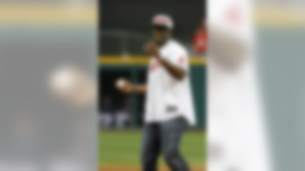 Cleveland Browns wide receiver Greg Little throws out a ceremonial pitch before a baseball game between the Cleveland Indians and the Detroit Tigers Tuesday, Sept. 6, 2011, in Cleveland. (AP Photo/Mark Duncan)