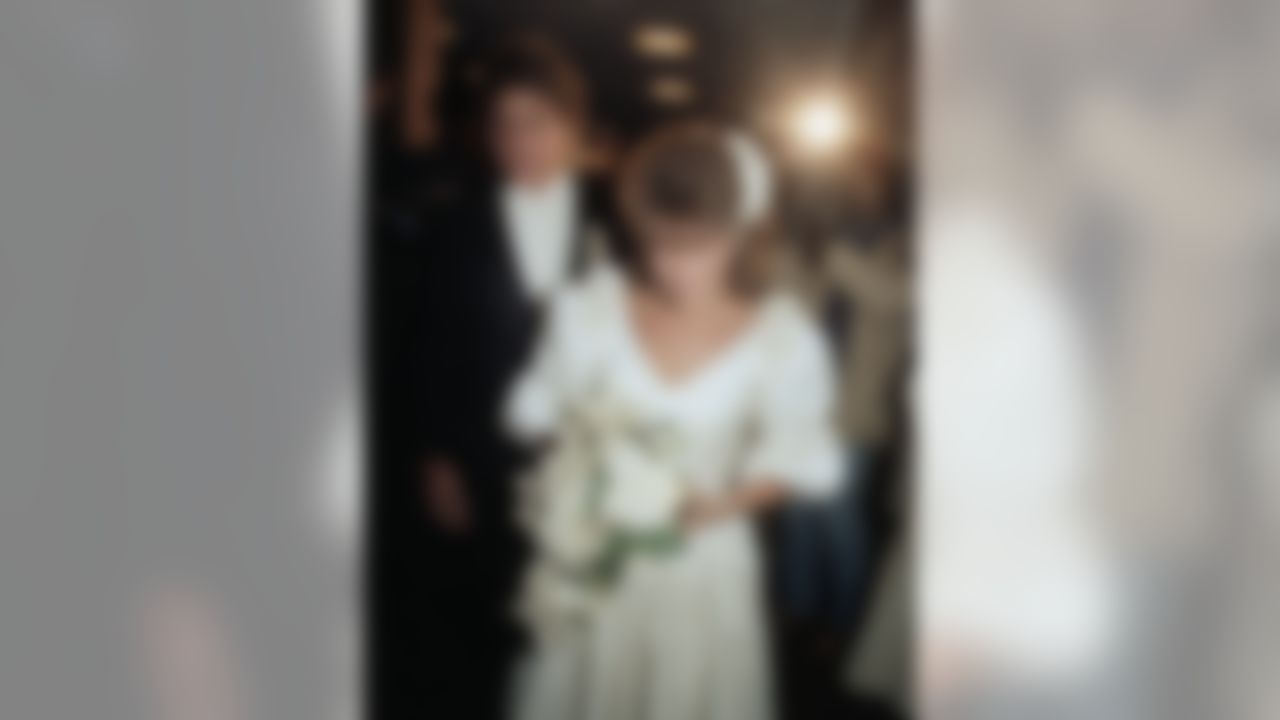 Miami Dolphins quarterback Dan Marino and his new wife Claire Veazey are shown following their wedding, Jan. 30, 1985 in Pittsburgh. (AP Photo/Gene Puskar)