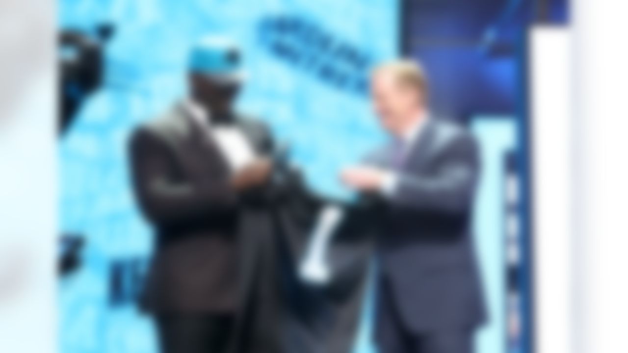 Louisiana Tech defensive tackle Vernon Butler holds up his jersey with NFL Commissioner Roger Goodell after being drafted by the Carolina Panthers during the 2016 NFL Draft at the Auditorium Theatre on Thursday, April 28, 2016 in Chicago. (Perry Knotts/NFL)