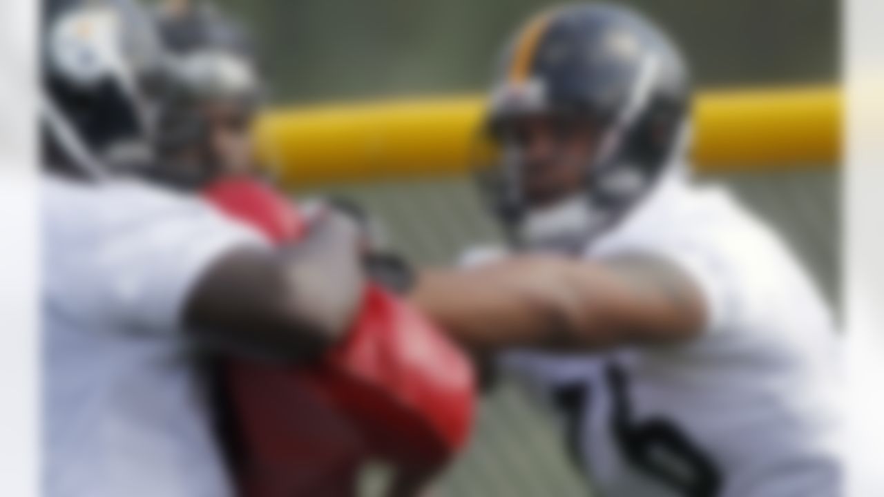 Pittsburgh Steelers tackle Mike Adams (76) goes through blocking drills during practice at NFL football training camp in Latrobe, Pa., Friday, July 27, 2012. (AP Photo/Keith Srakocic)