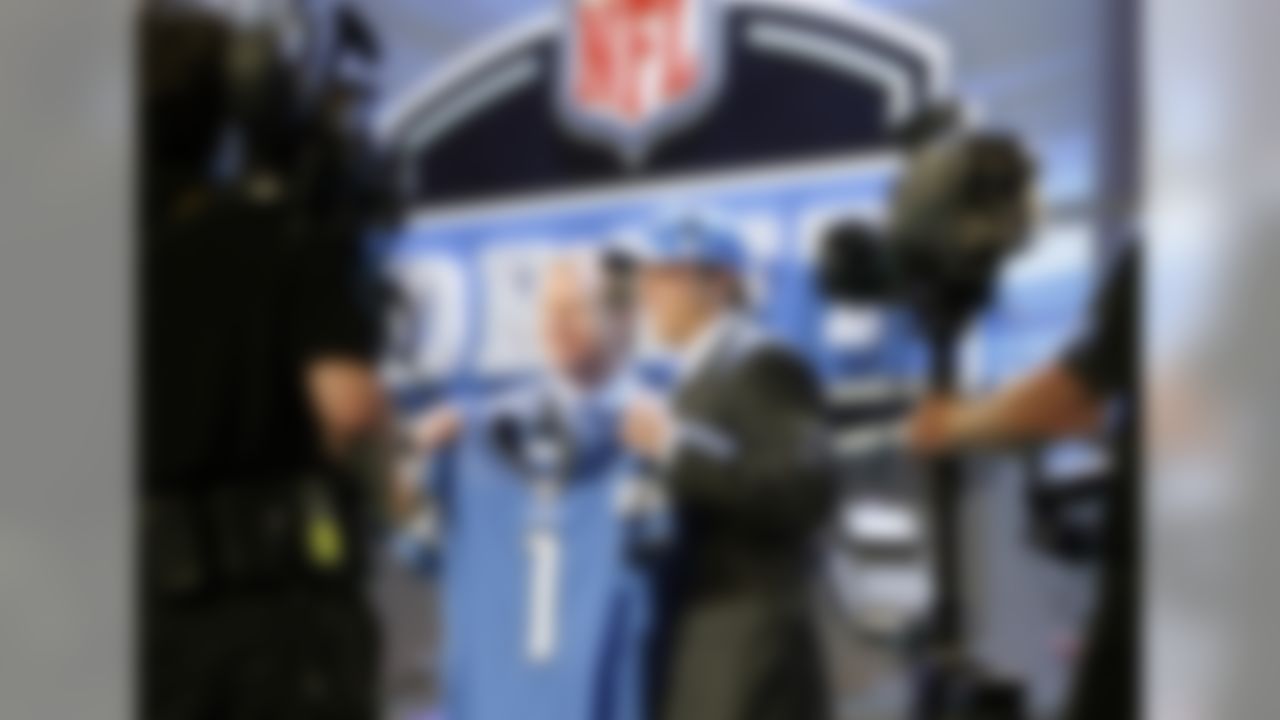 Georgia's Matthew Stafford, right, holds up a jersey with NFL commissioner Roger Goodell, after the Detroit Lions selected Stafford as the No. 1 overall pick in the NFL Draft at Radio City Music Hall Saturday, April 25, 2009, in New York. (Ben Liebenberg/NFL)