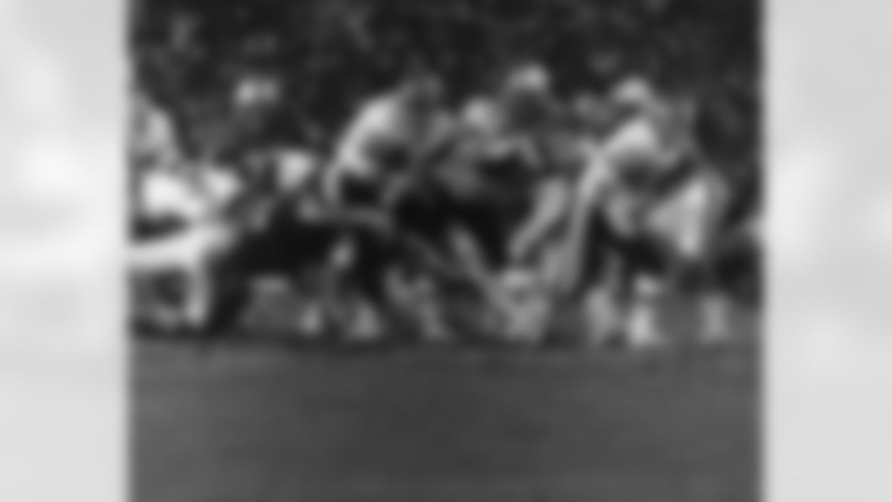 Washington Redskins running back John Riggins (44) runs upfield behind offensive guard Russ Grimm (68) in Super Bowl XVII resulting in a 17 to 27 Washington Redskins victory over the Miami Dolphins on January 30, 1983 at the Rose Bowl in Pasadena,CA. (National Football League)