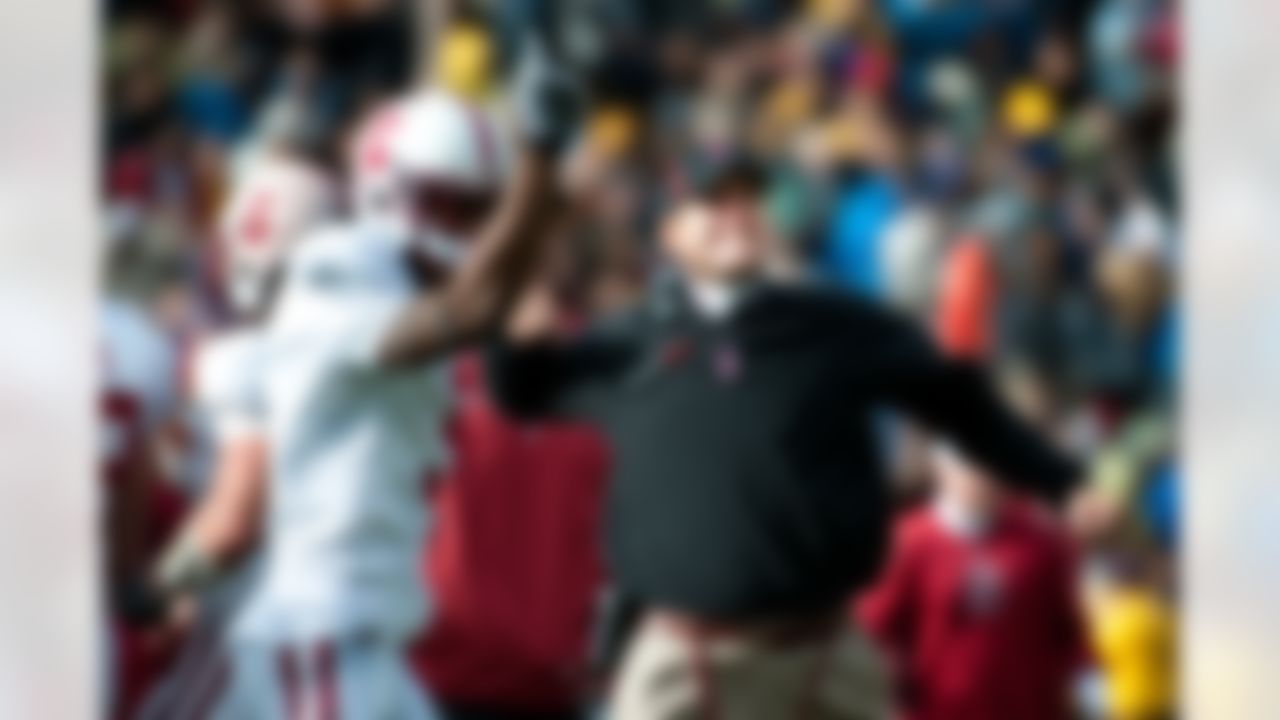 Stanford Cardinal head coach Jim Harbaugh celebrates a touchdown Memorial Stadium in Berkeley, CA on Saturday, November 20, 2010. (Courtesy Stanford Athletics/StanfordPhoto.com)
