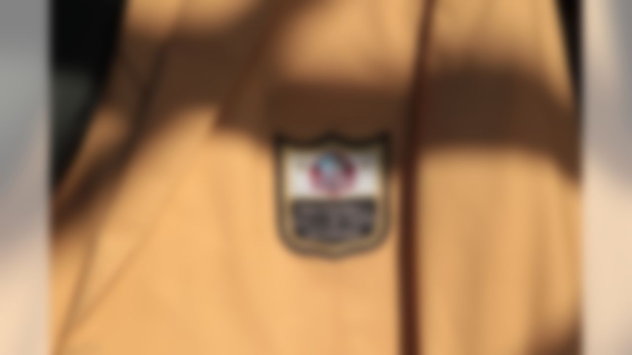 A Pro Football Hall of Fame Enshrinee patch is shown on a gold jacket at Fawcett Stadium in Canton, Ohio on August 4, 2012.  (Ben Liebenberg/NFL)