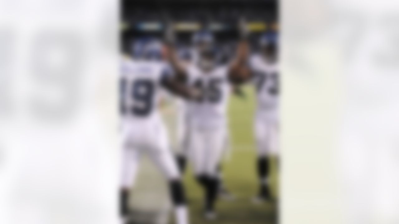 Seattle Seahawks running back Thomas Clayton celebrates with teammates after scoring against the San Diego Chargers during the second half of a preseason NFL football game at Qualcomm Stadium Thursday, Aug. 11, 2011, in San Diego. Seattle won 24-17. (AP Photo/Denis Poroy)