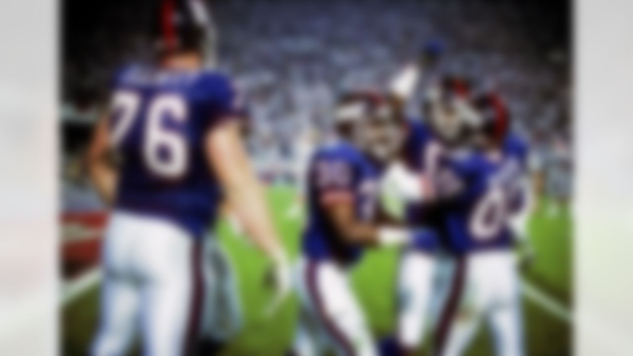 New York Giants wide receiver Stephen Baker (85) receives congratulations after scoring a touchdown during the second quarter of the Giants 20-19 victory over the Buffalo Bills in Super Bowl XXV at Tampa Stadium in Tampa, FL on January 27, 1991. (National Football League)