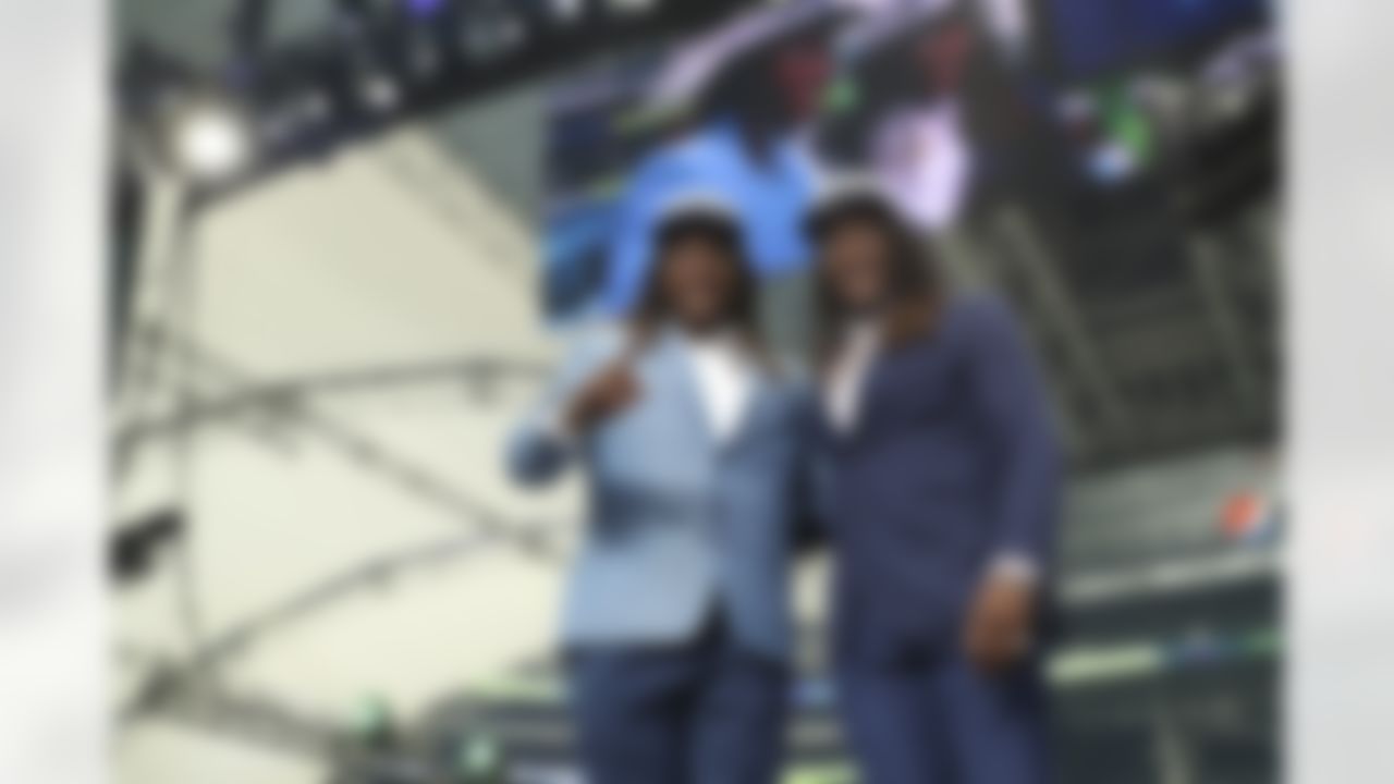 Shaquem Griffin and Shaquill Griffin celebrate together on stage.
