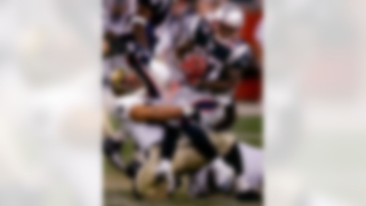 New Orleans Saints' Steve Gleason, left, takes down New England Patriots' Ellis Hobbs on a kickoff return during the first quarter in Foxborough, Mass., Thursday, Aug. 18, 2005. (AP Photo/Charles Krupa)