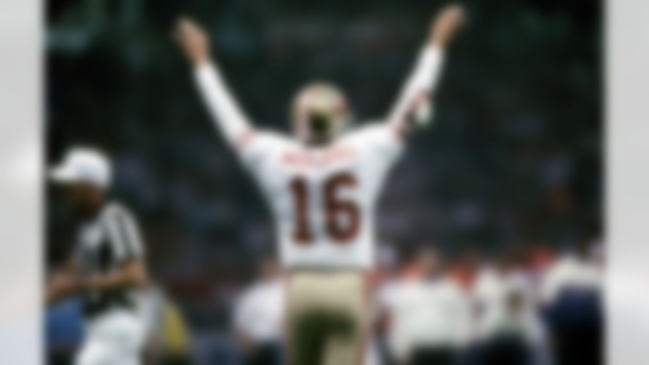 San Francisco 49er's quarterback Joe Montana (16) celebrates a touchdown at Super Bowl XXIV on January 28, 1990. San Francisco defeated the Denver Broncos 55 - 10. (AP Photo/Al Messerschmidt)