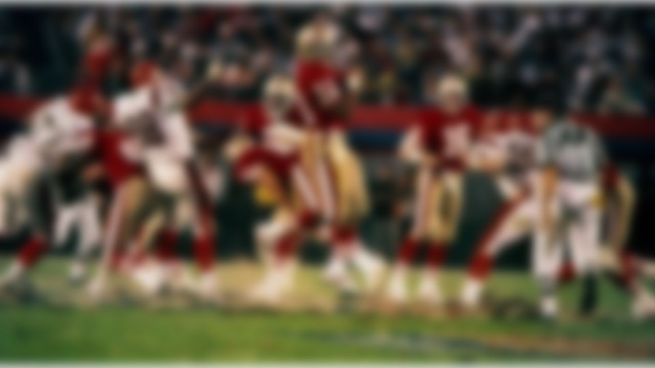 Running back Roger Craig of the San Francisco 49ers (33) makes a catch in a 20 -16 victory over the Cincinnati Bengals in Super Bowl XXIII on January 22, 1989 in Miami, Florida. This last possession late in the 4th quarter of the game by the 49ers is known as "The Drive." (AP Photo/Al Messerschmidt)