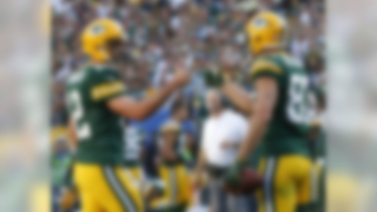 Green Bay Packers' Aaron Rodgers gives Jordy Nelson (87) a thumbs up after a touchdown catch during the second half of an NFL football game against the Seattle Seahawks Sunday, Sept. 10, 2017, in Green Bay, Wis.