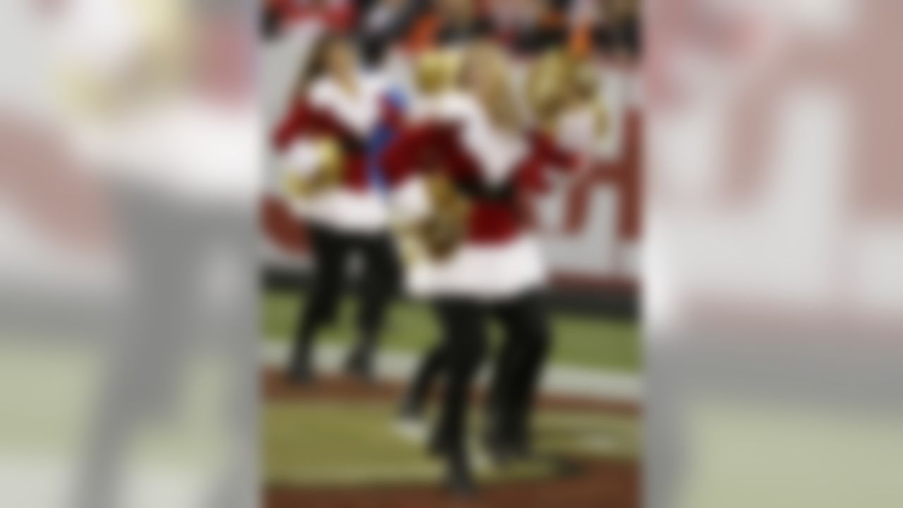 San Francisco 49ers cheerleaders perform during the second half of an NFL football game between the San Francisco 49ers and the Cincinnati Bengals in Santa Clara, Calif., Sunday, Dec. 20, 2015. (AP Photo/Eric Risberg)