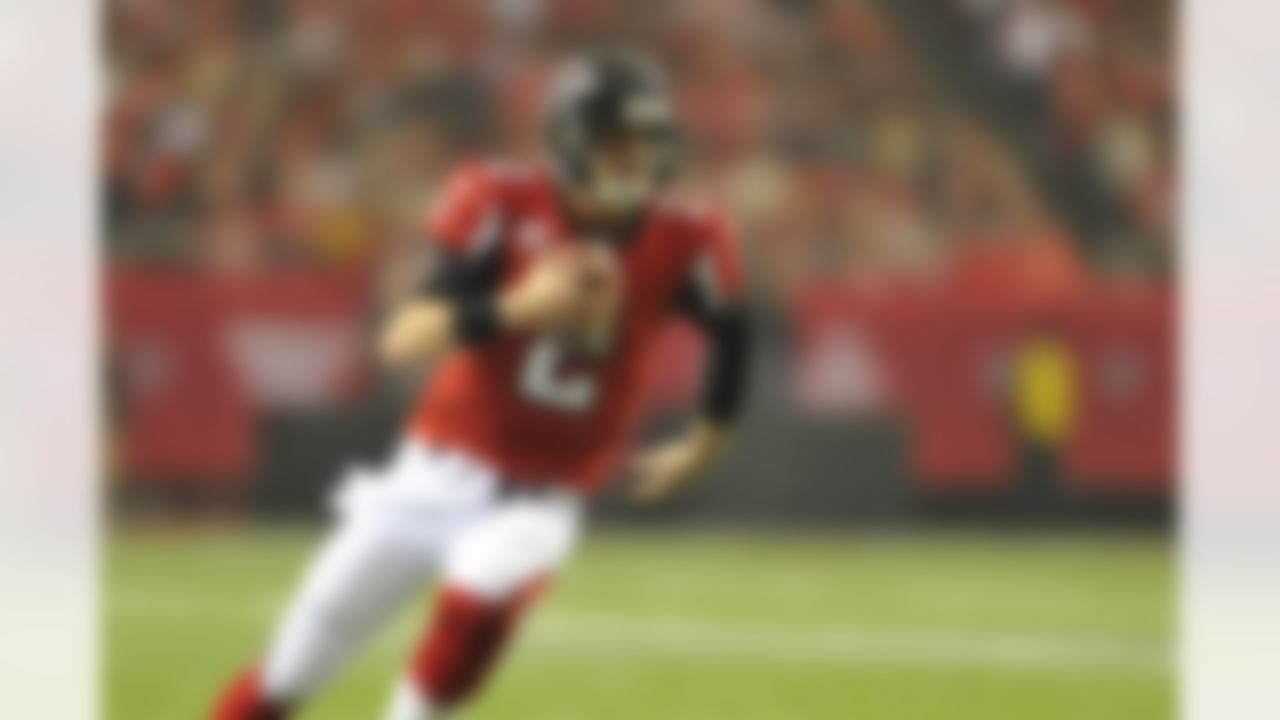 Atlanta Falcons quarterback Matt Ryan (2) carries the ball during an NFC Divisional Playoff NFL football game against the Seattle Seahawks, Sunday, January 13, 2013, in Atlanta. The Falcons won 30-28. (AP Photo/Paul Abell)