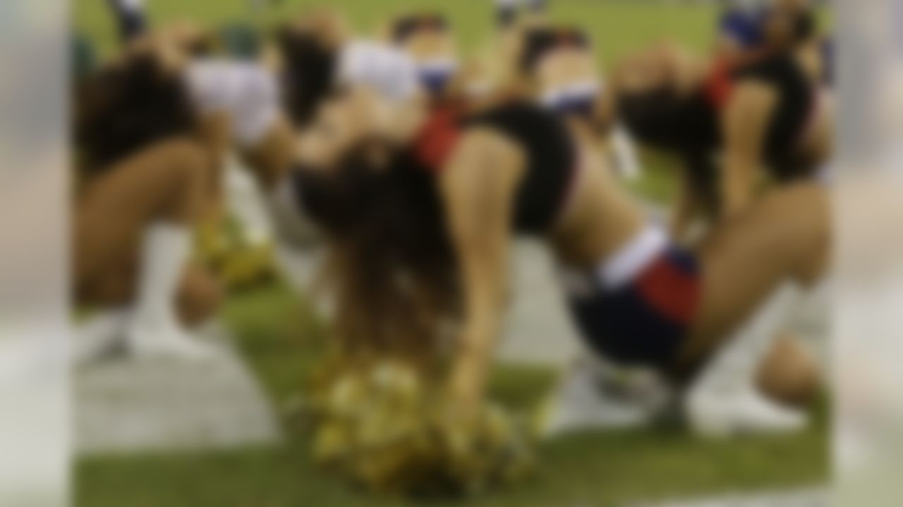 San Diego Chargers cheerleaders perform wearing Salute to Service uniforms during the first half of an NFL football game against the Chicago Bears, Monday, Nov. 9, 2015, in San Diego. (AP Photo/Lenny Ignelzi)